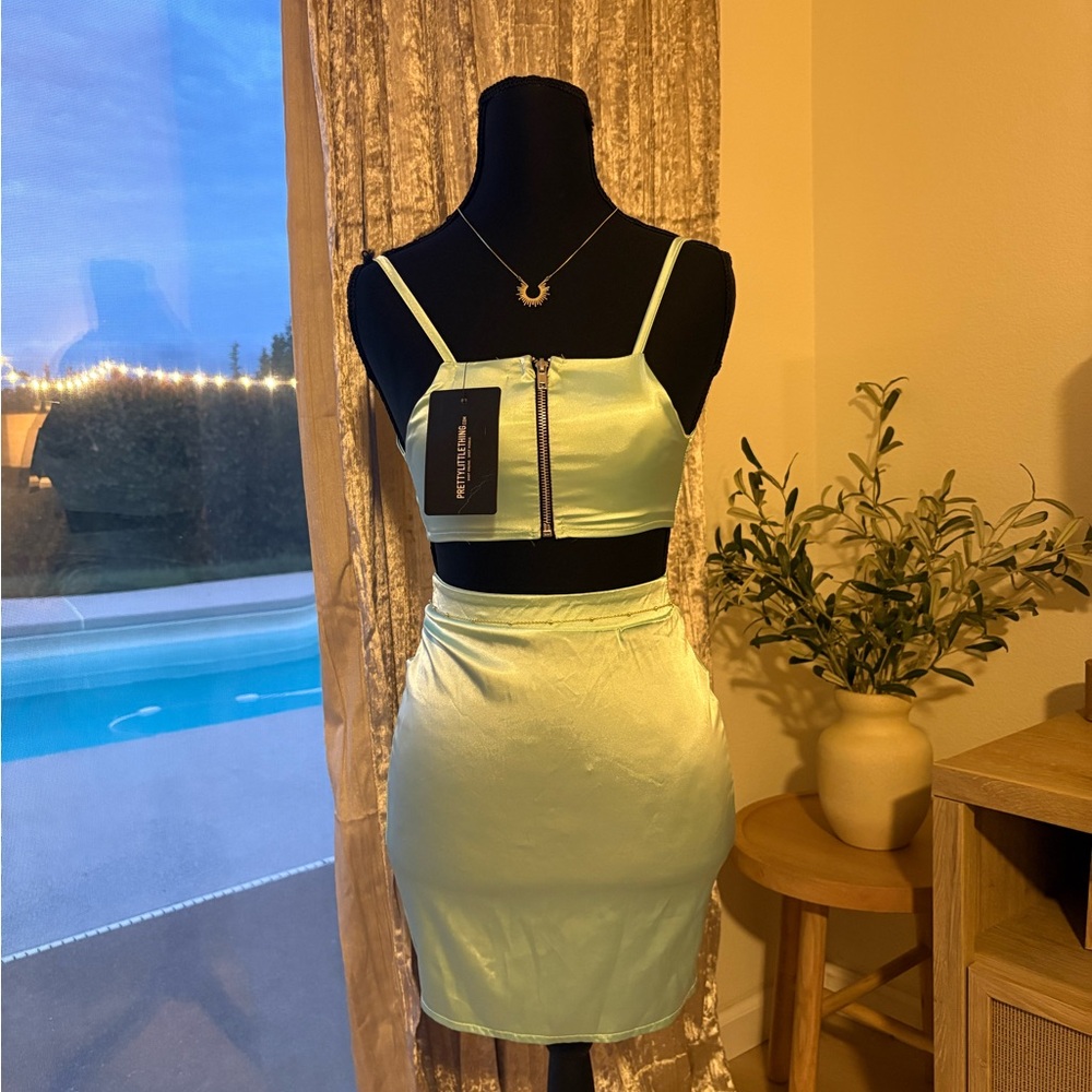 PrettyLittleThing Light Green Satin Two-Piece Crop Top & Skirt Set